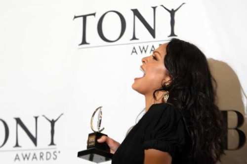 Karen Olivo exults in her win.