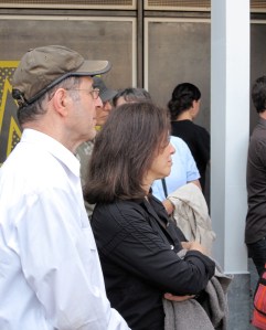 Reich and wife Beryl Korot listen to David Cossin play drums.