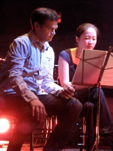 Linie C3's Chris Thompson and Haruka Fuji play their iPhones.