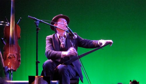 Adrian Stout plays the saw.