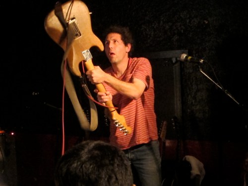 Ira Kaplan reaches for...