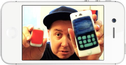Tim Fite with two Phoneys, the product of his latest project. (Kickstarter)