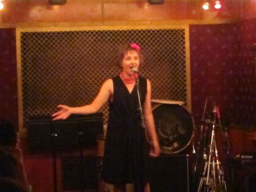 Cynthia Hopkins in a solo performance at Pete's Candy Store, 709 Lorimer St., Williamsburg, Brooklyn, on June 17, 2014. (Photo © 2014, Steven P. Marsh/willyoumissme.com)