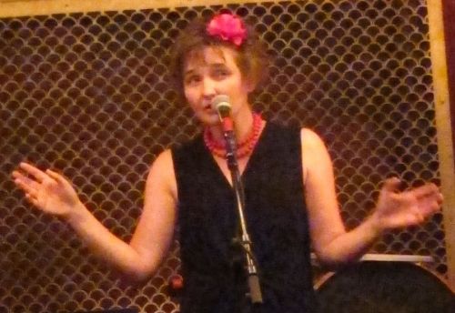 Cynthia Hopkins in a solo performance at Pete's Candy Store, 709 Lorimer St., Williamsburg, Brooklyn, on June 17, 2014. (Photo © 2014, Steven P. Marsh/willyoumissme.com)